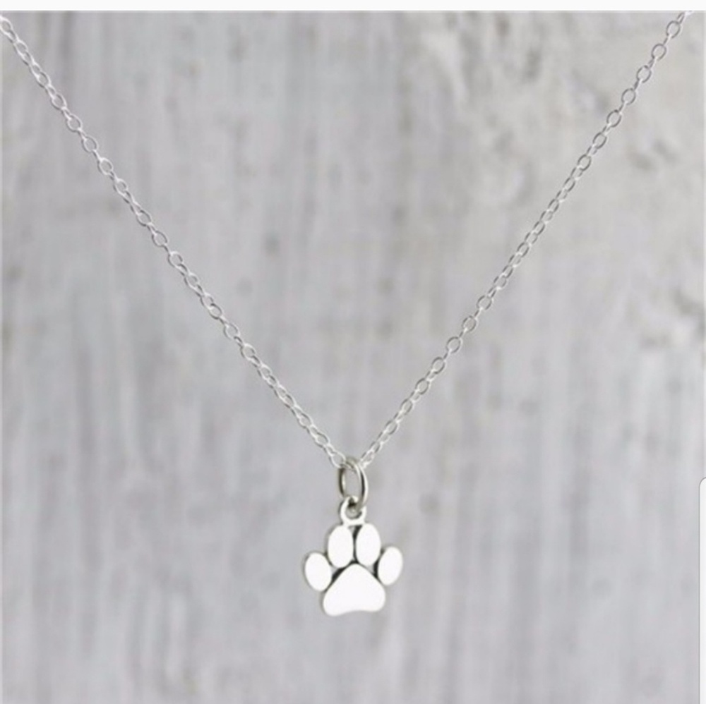 SOLD.  🐶🐕🐩NWT Silver Paw Necklace 🐕🐩